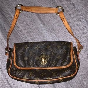 Very damaged, very authentic Louis Vuitton Purse